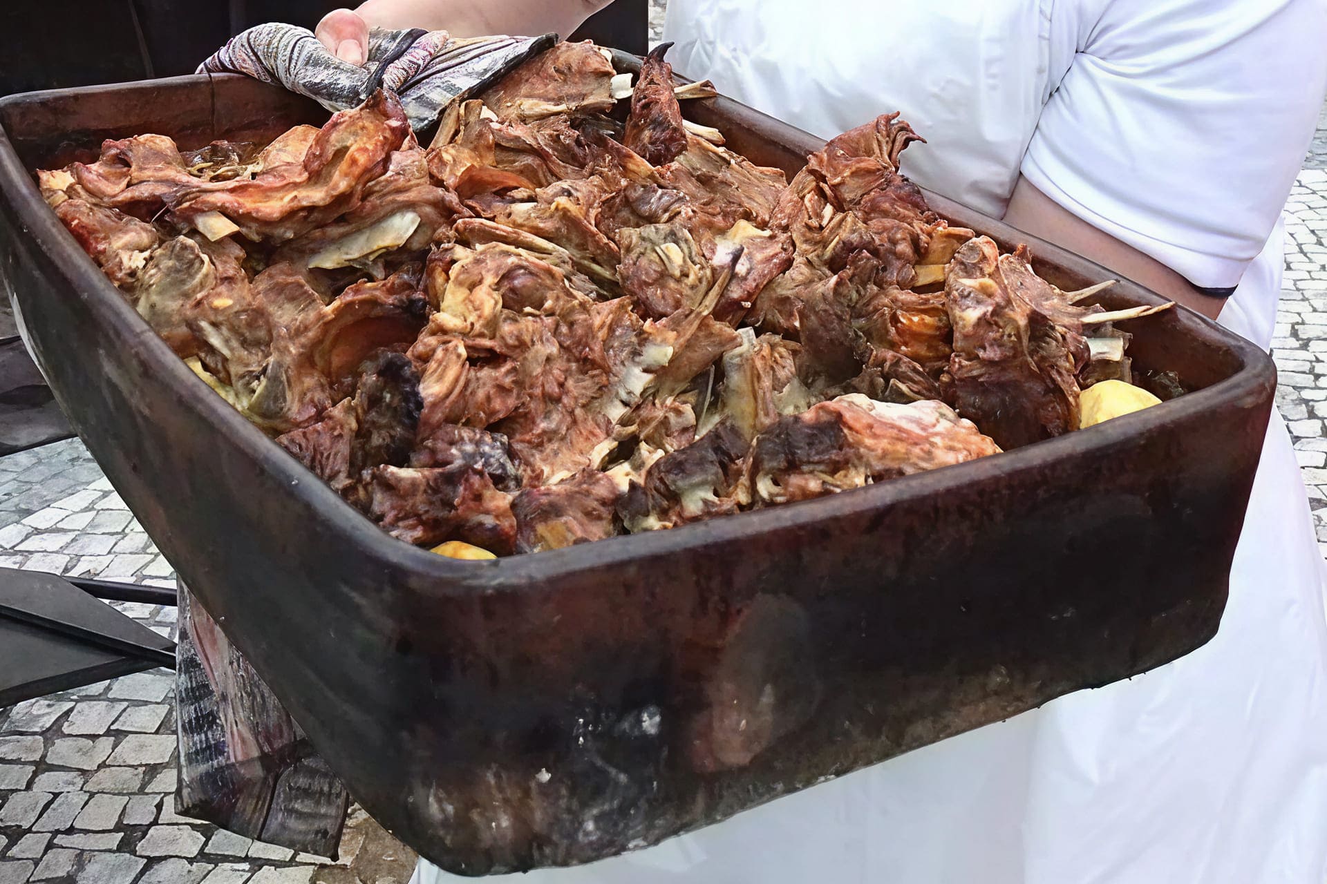 Anho assado em forno a lenha